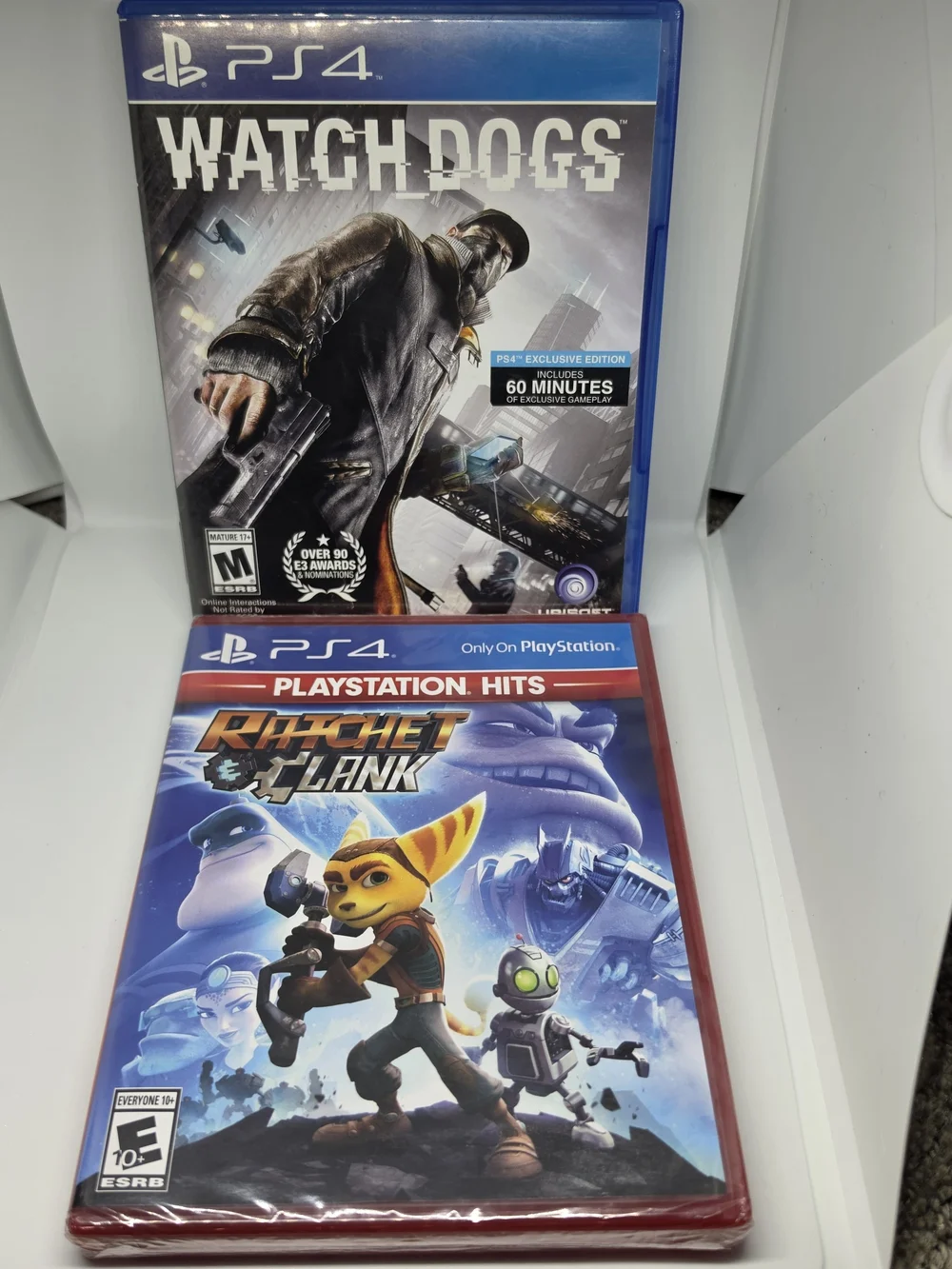 Sony PS4 Blue Watch Dogs & Ratchet & Clank Game Pair